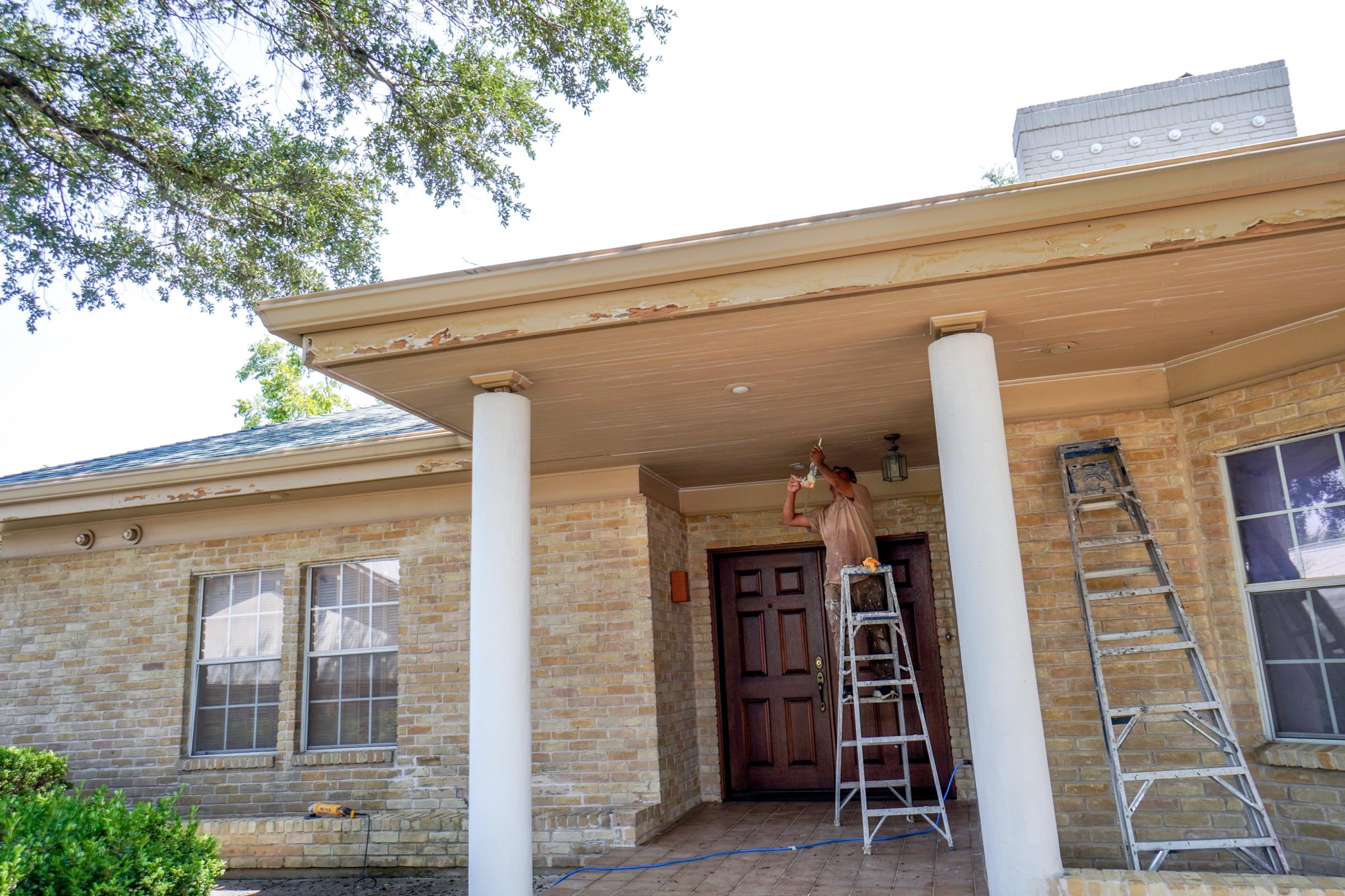 Front entry soffit before exterior restoration