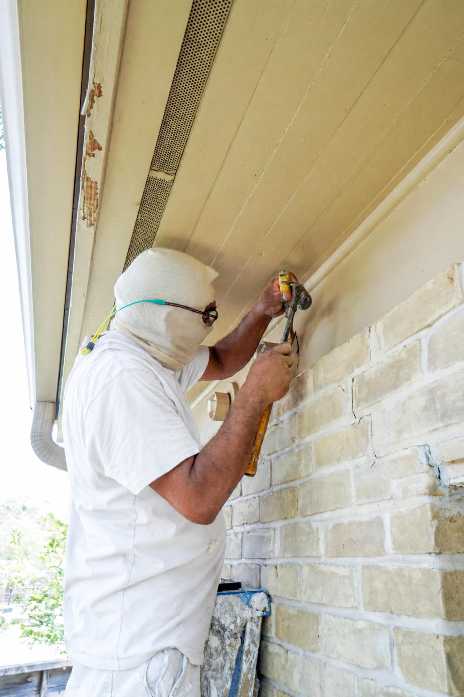 Close view of careful exterior wood repair