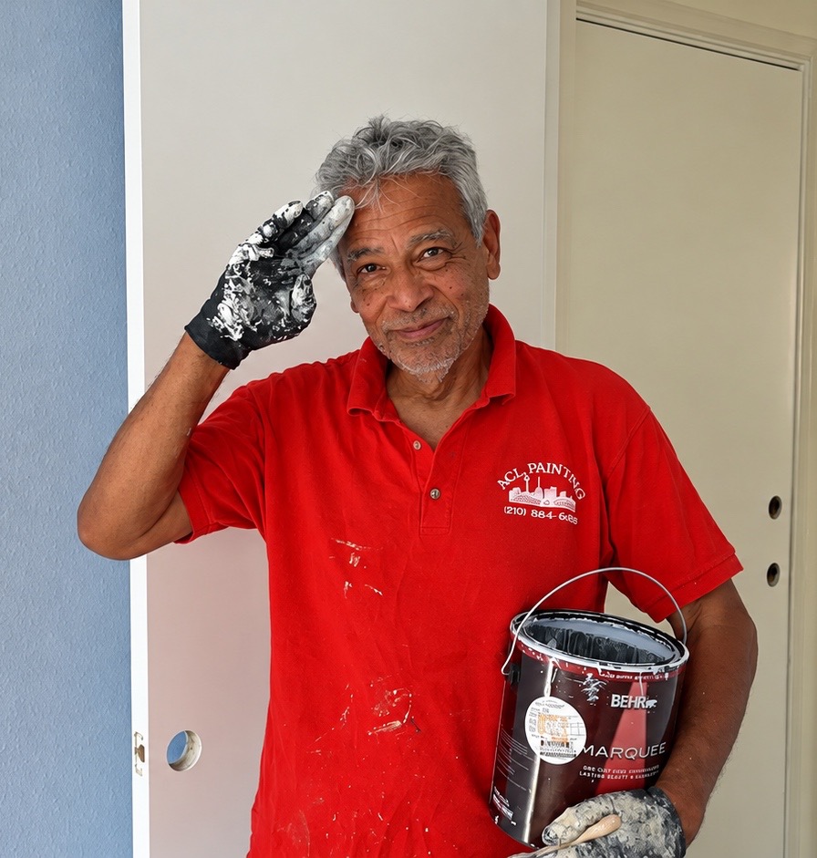 Michael Ramirez, owner of A.C.L. Painting, giving a friendly salute on a job site