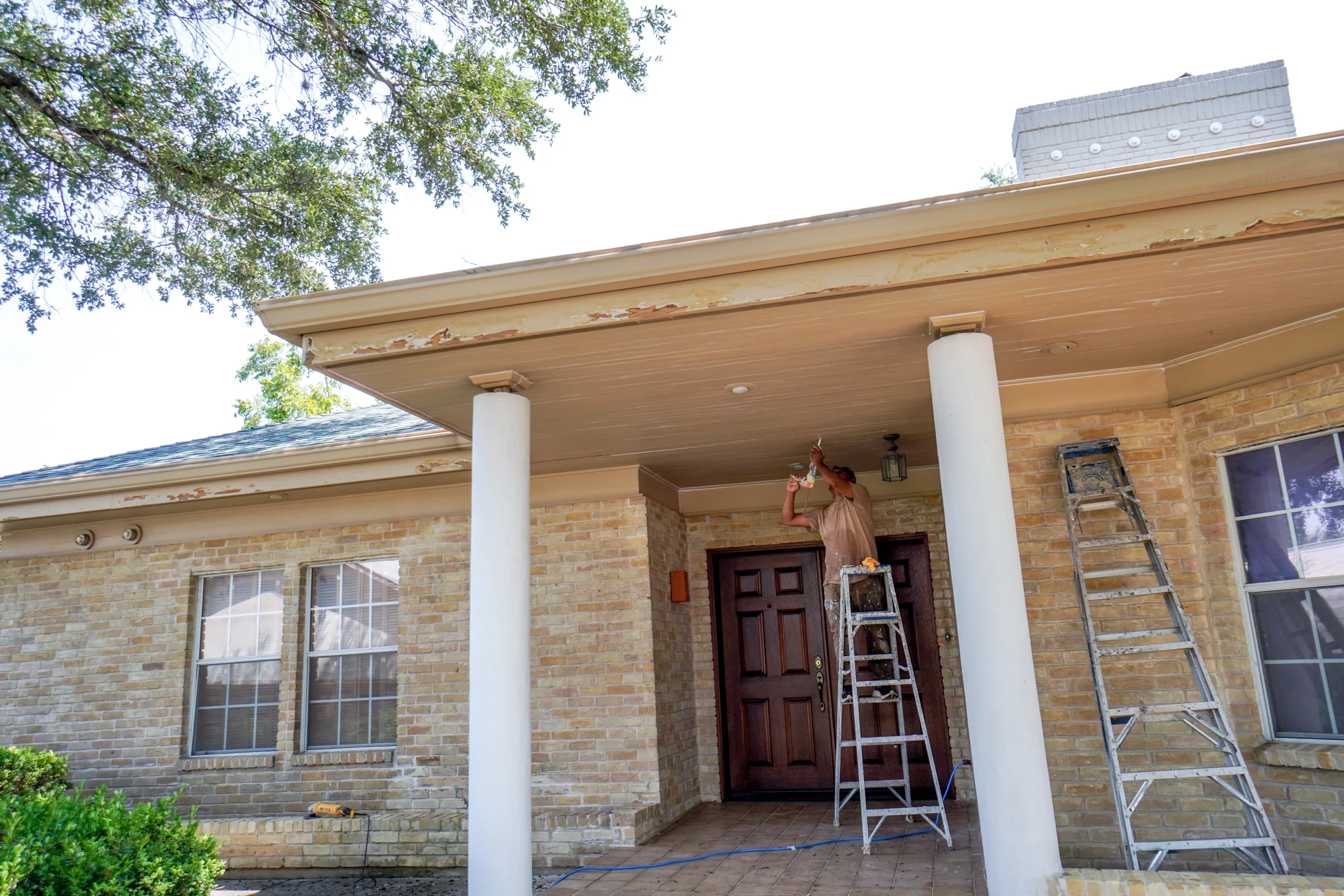 Front entry soffit before exterior restoration
