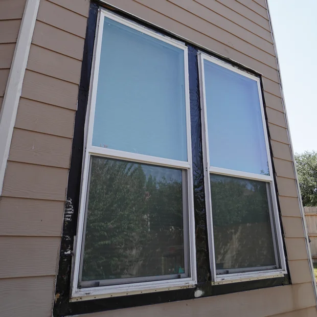 Window trim removed during wood repair